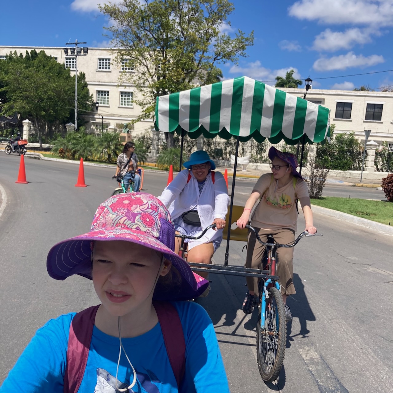 Riding bikes on the Paseo de Montejo